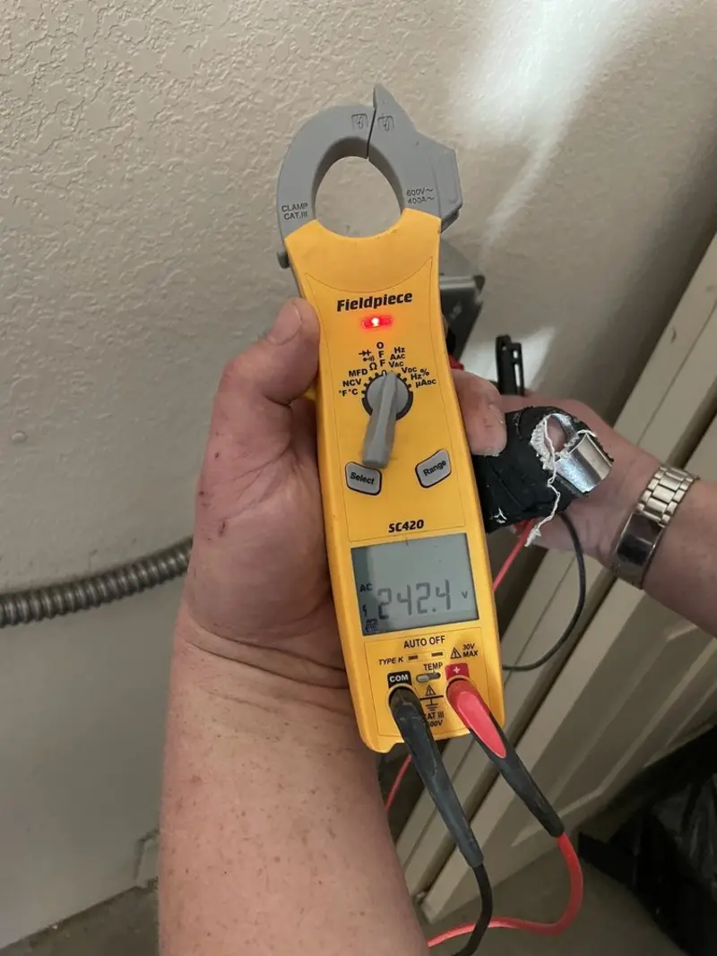 Voltage testing with clamp meter during Hot Tub / Pool Electrical Wiring in Aurelius